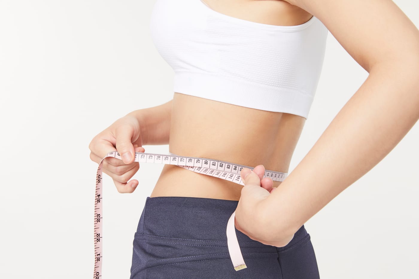 다미온의원 체형성형 안내 이미지 — 줄자로 허리둘레를 재는 모습